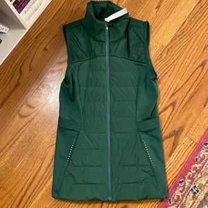Like new Lululemon “run for it all” green vest